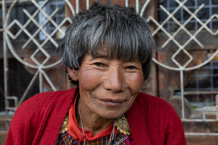 Woman outside store in Katsho village, Haa Valley