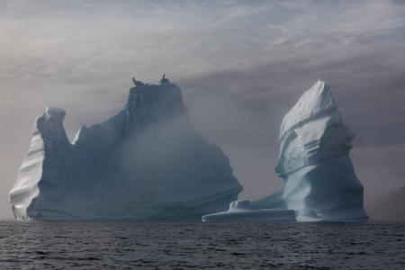 Iceberg with morning mist near Tasiilaq, Greenland